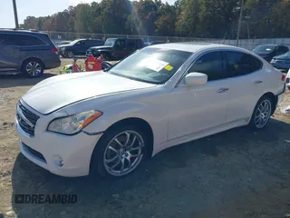2012 Infiniti M37 with VIN JN1BY1AP6CM333466, listed as a IAAI auction lot 40723440 with 156,102 mi miles. Bid and sale history available at carsss.com. Image 18.