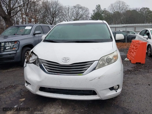 2012 Toyota Sienna XLE AAS with VIN 5TDYK3DC3CS274619, listed as a IAAI auction lot 41558898 with 218,106 mi miles. Bid and sale history available at carsss.com. Image 12.