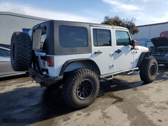 2012 Jeep Wrangler Unlimited Sport with VIN 1C4BJWDG5CL172074, listed as a Copart auction lot 84883964 with 112,006 mi miles and Salvage Title. Bid and sale history available at carsss.com. Image 3.