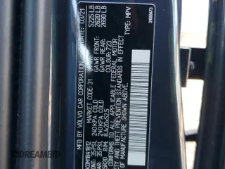 2021 Volvo XC60 Momentum z VIN YV4102DK0M1841812, wystawiony jako Copart lot #42365255 z przebiegiem 26 441 mil mil oraz Szkoda całkowita • Salvage title. Historia ofert i sprzedaży dostępna na DreamBid. Obrazek 13.