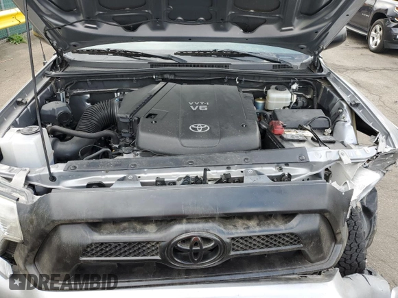 2015 Toyota Tacoma with VIN 3TMLU4EN4FM168078, listed as a Copart auction lot 54689785 with 103,716 mi miles and Salvage Title. Bid and sale history available at DreamBid. Image 11.