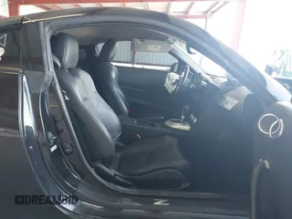2008 Nissan 350Z z VIN JN1BZ34D98M705867, wystawiony jako IAAI lot #41871586 z przebiegiem 90 717 mil mil oraz . Historia ofert i sprzedaży dostępna na DreamBid. Obrazek 5.