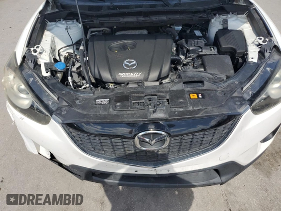 2015 Mazda CX-5 Sport z VIN JM3KE2BE6F0546994, wystawiony jako Copart lot #61948075 z przebiegiem 111 845 mil mil oraz Czysty tytuł • Clean title. Historia ofert i sprzedaży dostępna na DreamBid. Obrazek 12.