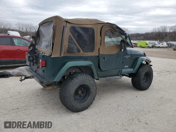 2000 Jeep Wrangler Sahara z VIN 1J4FA59S5YP803327, wystawiony jako Copart lot #44382505 z przebiegiem Nie podano mil oraz Szkoda całkowita • Salvage title. Historia ofert i sprzedaży dostępna na DreamBid. Obrazek 3.