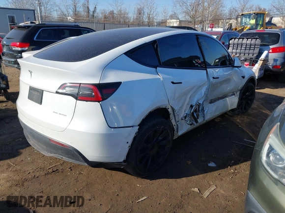 2021 Tesla Model Y Long Range with VIN 5YJYGDEE5MF203175, listed as a IAAI auction lot 41758334 with 63,387 mi miles and . Bid and sale history available at DreamBid. Image 4.