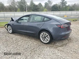 2022 Tesla Model 3 with VIN 5YJ3E1EA4NF371483, listed as a Copart auction lot 49287665 with 59,476 mi miles and Salvage Title. Bid and sale history available at DreamBid. Image 2.