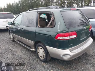 2001 Toyota Sienna LE with VIN 4T3ZF13C91U352296, listed as a IAAI auction lot 41647762 with 262,803 mi miles. Bid and sale history available at carsss.com. Image 3.