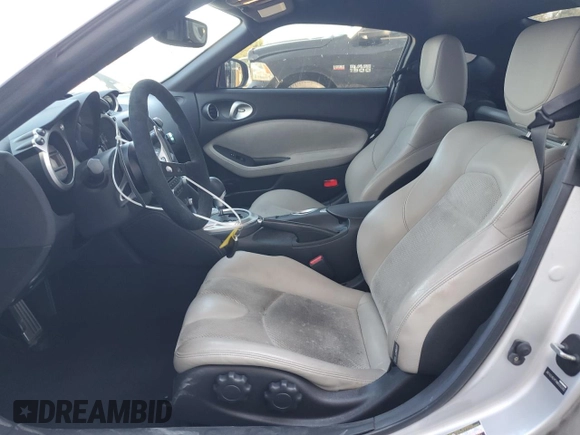 2010 Nissan 370Z with VIN JN1AZ4EH7AM500282, listed as a Copart auction lot 76578084 with 65,773 mi miles and Salvage Title. Bid and sale history available at DreamBid. Image 7.