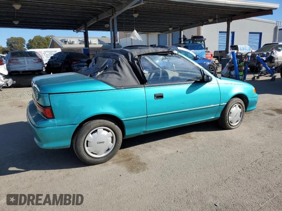 1993 Geo Metro z VIN JG1MR3367PK201491, wystawiony jako Copart lot #41543565 z przebiegiem 61 829 mil mil oraz Tytuł czysty. Historia ofert i sprzedaży dostępna na DreamBid. Obrazek 3.