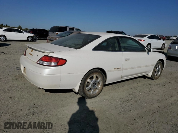 2001 Toyota Solara SE with VIN 2T1CF22P81C458104, listed as a Copart auction lot 73561244 with 74,177 mi miles and Salvage Title. Bid and sale history available at carsss.com. Image 3.