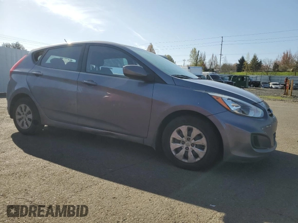 2015 Hyundai Accent GS with VIN KMHCT5AE7FU217859, listed as a Copart auction lot 52044405 with 60,247 mi miles and Salvage Title. Bid and sale history available at carsss.com. Image 4.