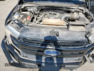 2019 Ford F-150 XL with VIN 1FTEW1EP2KFC25018, listed as a Copart auction lot 63105465 with 60,331 mi miles and Salvage title. Bid and sale history available at DreamBid. Image 11.
