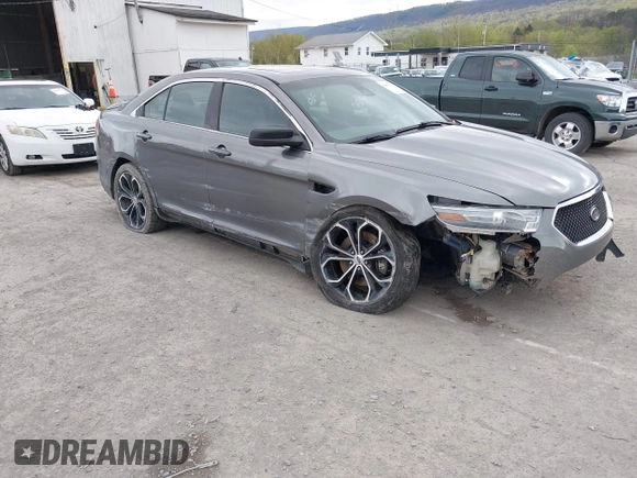 2014 Ford Taurus SHO with VIN 1FAHP2KTXEG160800, listed as a IAAI auction lot 42083237 with 75,048 mi miles. Bid and sale history available at carsss.com. Image 1.