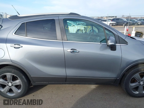 2014 Buick Encore with VIN KL4CJASB0EB727448, listed as a IAAI auction lot 41777697 with 128,812 mi miles. Bid and sale history available at carsss.com. Image 13.