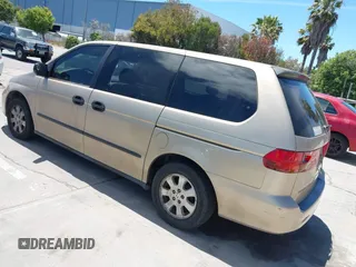 2001 Honda Odyssey LX z VIN 2HKRL18501H610649, wystawiony jako IAAI lot #42799158 z przebiegiem 197 944 mil mil oraz . Historia ofert i sprzedaży dostępna na DreamBid. Obrazek 3.