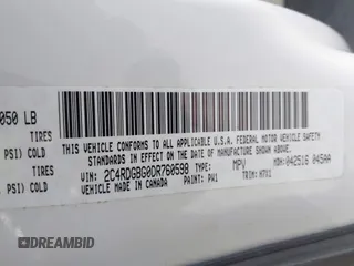 2013 Dodge Grand Caravan SE with VIN 2C4RDGBG0DR760598, listed as a IAAI auction lot 41590428 with 182,847 mi miles and . Bid and sale history available at DreamBid. Image 9.