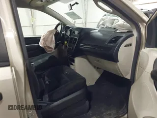 2015 Dodge Grand Caravan SE with VIN 2C4RDGBG2FR592899, listed as a IAAI auction lot 41309499 with 110,428 mi miles and . Bid and sale history available at DreamBid. Image 5.