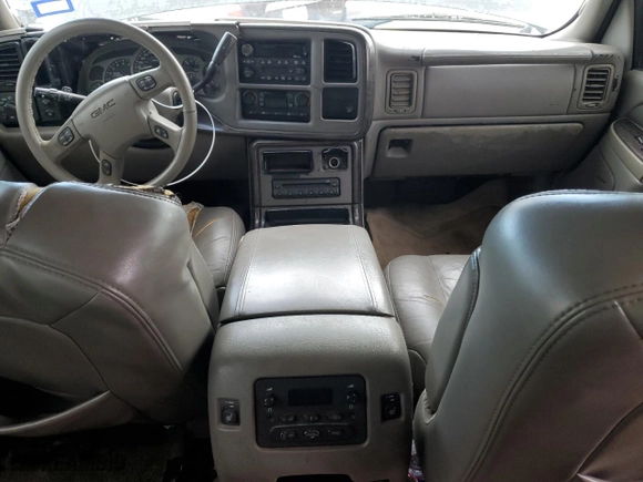 2003 GMC Yukon Denali with VIN 1GKEK63UX3J336663, listed as a Copart auction lot 68936304 with 203,294 mi miles and Clean Title. Bid and sale history available at carsss.com. Image 8.