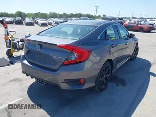 2019 Honda Civic Sport with VIN 19XFC2F89KE019683, listed as a IAAI auction lot 42055871 with 107,941 mi miles and . Bid and sale history available at DreamBid. Image 4.