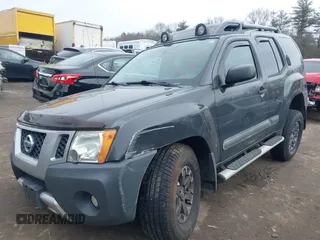 2014 Nissan Xterra X with VIN 5N1AN0NW5EN810488, listed as a IAAI auction lot 41705791 with 127,936 mi miles and . Bid and sale history available at DreamBid. Image 17.
