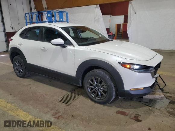 2022 Mazda CX-30 S with VIN 3MVDMBAL9NM410566, listed as a Copart auction lot 50513215 with 26,852 mi miles and Salvage Title. Bid and sale history available at DreamBid. Image 4.