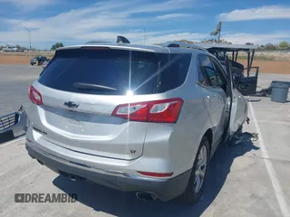 2020 Chevrolet Equinox LT with VIN 3GNAXLEX2LS609943, listed as a IAAI auction lot 42014464 with 80,942 mi miles. Bid and sale history available at carsss.com. Image 4.