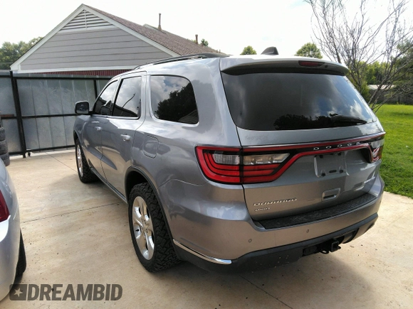2015 Dodge Durango Limited with VIN 1C4RDJDGXFC810526, listed as a IAAI auction lot 42717037 with 158,160 mi miles and . Bid and sale history available at DreamBid. Image 3.