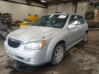 2006 Kia Spectra with VIN KNAFE161X65283615, listed as a IAAI auction lot 41955968 with 185,177 mi miles. Bid and sale history available at carsss.com. Image 2.