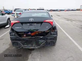 2019 Toyota Corolla L with VIN 5YFBURHE5KP945925, listed as a IAAI auction lot 41493079 with 96,849 mi miles and . Bid and sale history available at carsss.com. Image 17.