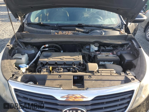 2013 Kia Sportage EX z VIN KNDPC3A24D7444857, wystawiony jako Copart lot #49819125 z przebiegiem 146 066 mil mil oraz Szkoda całkowita • Salvage title. Historia ofert i sprzedaży dostępna na DreamBid. Obrazek 12.