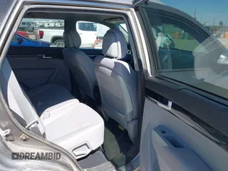 2015 Kia Sorento LX with VIN 5XYKTCA69FG584972, listed as a IAAI auction lot 42315973 with 165,907 mi miles and . Bid and sale history available at DreamBid. Image 8.