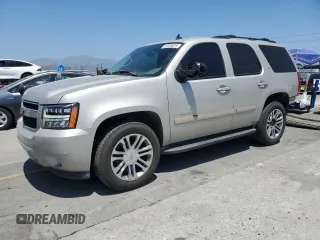 2007 Chevrolet Tahoe LTZ with VIN 1GNFC13057R376287, listed as a Copart auction lot 61723675 with 156,465 mi miles and Salvage title. Bid and sale history available at DreamBid. Image 1.