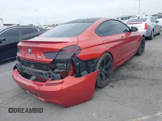 2013 BMW M6 z VIN WBSLX9C55DC968497, wystawiony jako IAAI lot #41863884 z przebiegiem 128 241 mil mil oraz . Historia ofert i sprzedaży dostępna na DreamBid. Obrazek 4.