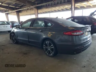 2020 Ford Fusion Titanium with VIN 3FA6P0K92LR115615, listed as a Copart auction lot 60471975 with 73,069 mi miles and Salvage title. Bid and sale history available at DreamBid. Image 2.