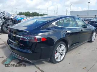 2014 Tesla Model S 60 с VIN 5YJSA1H17EFP41957, выставлен на аукционе IAAI как лот 42448795 с пробегом 103 990 миль миль и . История ставок и продаж доступна на DreamBid. Изображение 4.