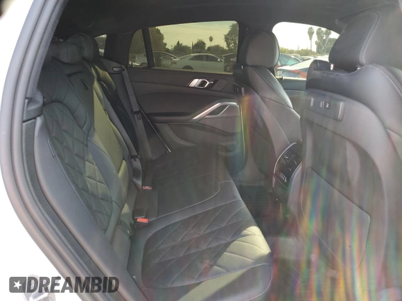 2023 BMW X6 xDrive40i z VIN 5UXCY6C02P9P43834, wystawiony jako Copart lot #85347614 z przebiegiem 16 921 mil mil oraz Szkoda całkowita • Salvage title. Historia ofert i sprzedaży dostępna na DreamBid. Obrazek 11.