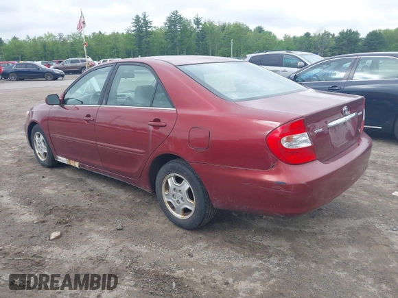 2003 Toyota Camry LE z VIN 4T1BF32K63U050174, wystawiony jako IAAI lot #42260843 z przebiegiem 210 486 mil mil oraz . Historia ofert i sprzedaży dostępna na DreamBid. Obrazek 3.
