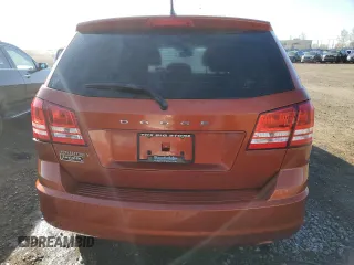 2013 Dodge Journey American Value with VIN 3C4PDCAB4DT590975, listed as a Copart auction lot 55627725 with 212,659 mi miles and Clean Title. Bid and sale history available at DreamBid. Image 6.