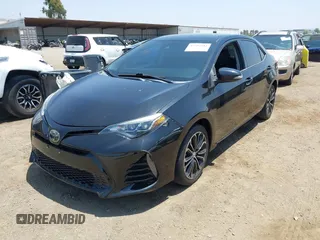 2017 Toyota Corolla L with VIN 5YFBURHE1HP712536, listed as a IAAI auction lot 42592613 with 76,672 mi miles and . Bid and sale history available at DreamBid. Image 2.