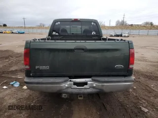 2000 Ford F-250 XL with VIN 1FTNW21F5YEB21513, listed as a Copart auction lot 82013464 with 383,819 mi miles and Salvage title. Bid and sale history available at DreamBid. Image 6.