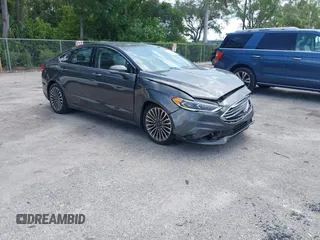 2018 Ford Fusion Titanium with VIN 3FA6P0D9XJR169657, listed as a IAAI auction lot 42392112 with 62,754 mi miles and . Bid and sale history available at DreamBid. Image 1.