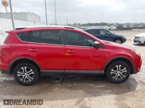 2016 Toyota RAV4 LE with VIN 2T3ZFREV4GW252399, listed as a IAAI auction lot 41955913 with 159,830 mi miles and . Bid and sale history available at carsss.com. Image 13.