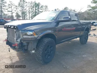 2017 Ram 2500 Laramie with VIN 3C6UR5FL9HG759802, listed as a IAAI auction lot 41428560 with 140,101 mi miles. Bid and sale history available at carsss.com. Image 2.