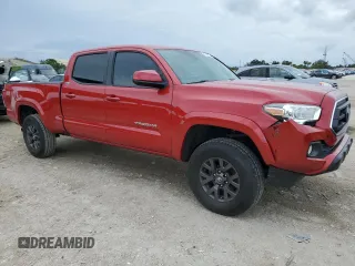 2020 Toyota Tacoma SR5 with VIN 3TMDZ5BN6LM095260, listed as a Copart auction lot 51688925 with 62,933 mi miles and Salvage title. Bid and sale history available at DreamBid. Image 4.