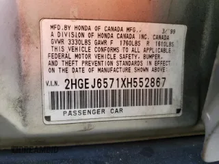 1999 Honda Civic LX with VIN 2HGEJ6571XH552867, listed as a Copart auction lot 81715654 with 234,544 mi miles and Salvage Title. Bid and sale history available at DreamBid. Image 12.