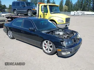 2000 Lexus LS 400 with VIN JT8BH28F8Y0168386, listed as a IAAI auction lot 42063155 with Not Provided miles and . Bid and sale history available at carsss.com. Image 1.