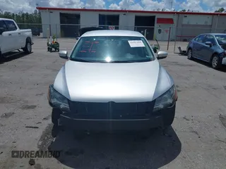2015 Volkswagen Passat 1.8T Limited Edition with VIN 1VWAT7A35FC109653, listed as a IAAI auction lot 41917568 with 118,912 mi miles. Bid and sale history available at carsss.com. Image 12.
