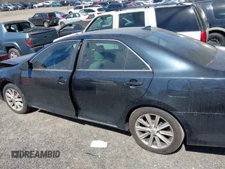 2012 Toyota Camry SE with VIN 4T1BK1FK2CU521649, listed as a IAAI auction lot 41852769 with 260,239 mi miles. Bid and sale history available at carsss.com. Image 14.