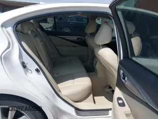 2014 Infiniti Q50 Premium z VIN JN1BV7AP8EM691683, wystawiony jako IAAI lot #42064258 z przebiegiem 146 805 mil mil oraz . Historia ofert i sprzedaży dostępna na DreamBid. Obrazek 8.