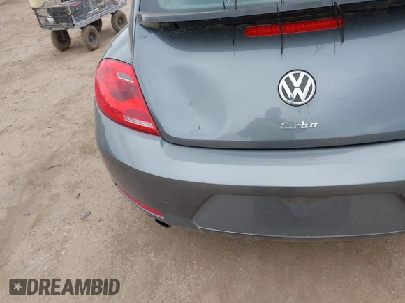2012 Volkswagen Beetle with VIN 3VWV67AT0CM663718, listed as a IAAI auction lot 41860510 with 99,932 mi miles and . Bid and sale history available at DreamBid. Image 6.